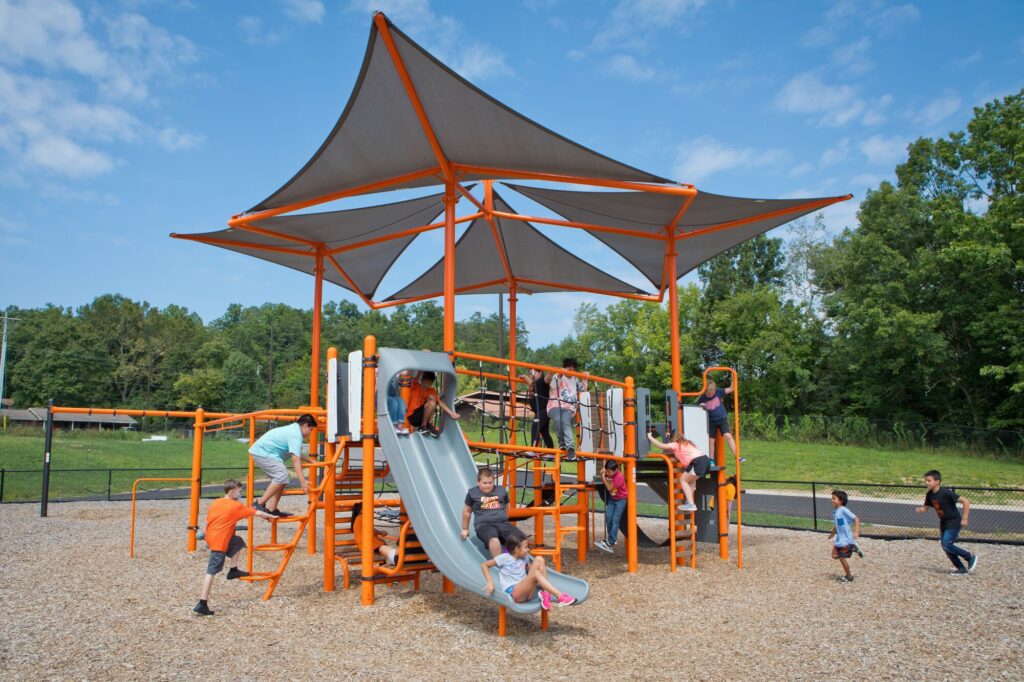 compact play structure with built in shade