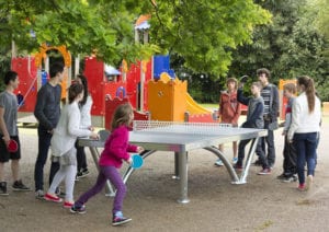 children playing ping pong