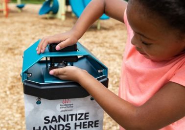 girl with hand sanitizer