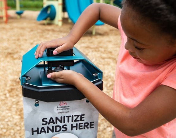 girl with hand sanitizer